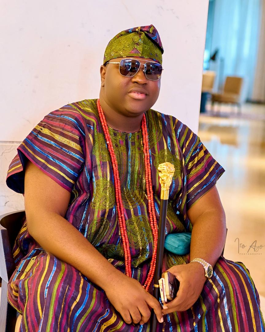 Prince Fuhad Oloto in traditional attire with sunglasses